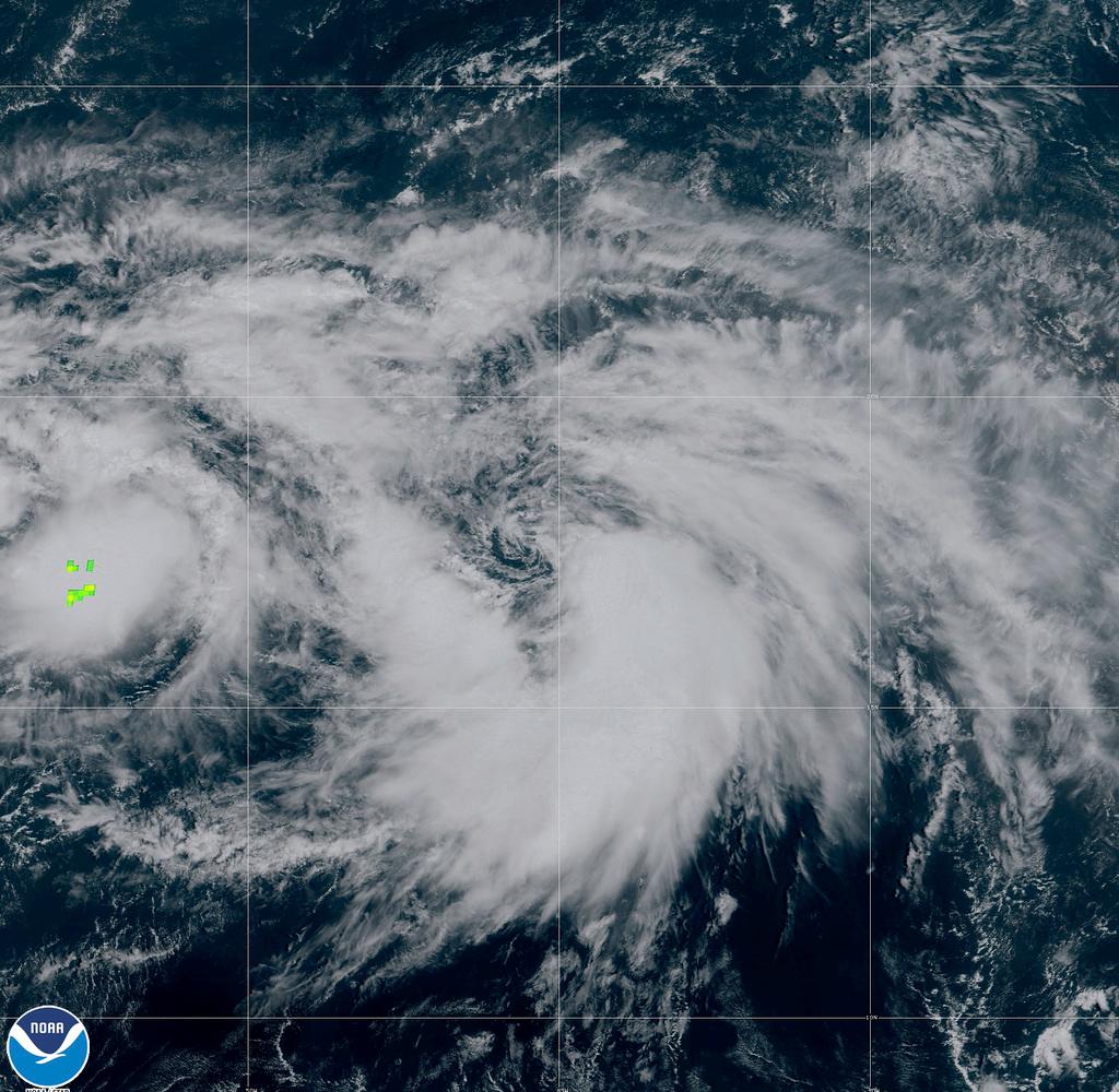 This satellite image provided by NOAA on 11:11 am EST Thursday, Sept. 28, 2023 shows Tropical Storm Rina forming in the Atlantic Ocean. Rina had maximum sustained winds of 40 mph (65 kph) and was centered 1,190 miles (1,915 kilometers) east of the Northern Leeward Islands. No coastal watches or warnings are in effect for the storm, and there were no hazards affecting land.