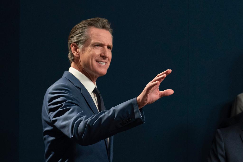 California Gov. Gavin Newsom answers a question concerning three gun control measures he signed during a news conference in Sacramento, Calif., Sept. 26, 2023.