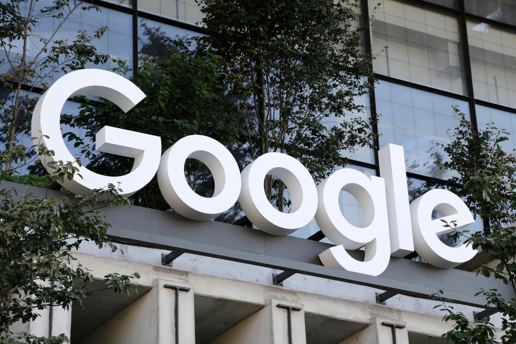  A Google sign hangs over an entrance to the company's new building, Sept. 6, 2023, in New York.