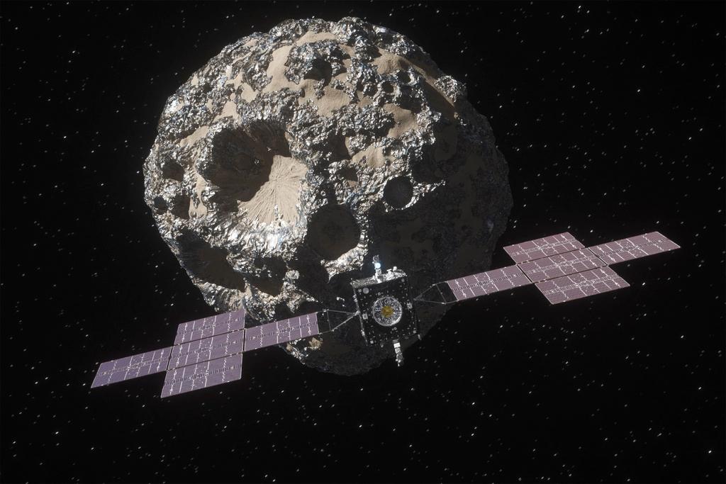 Animation depicts the spacecraft Psyche approaching the asteroid Psyche. A NASA spacecraft has rocketed away on a six-year journey to a rare asteroid made of metal. 