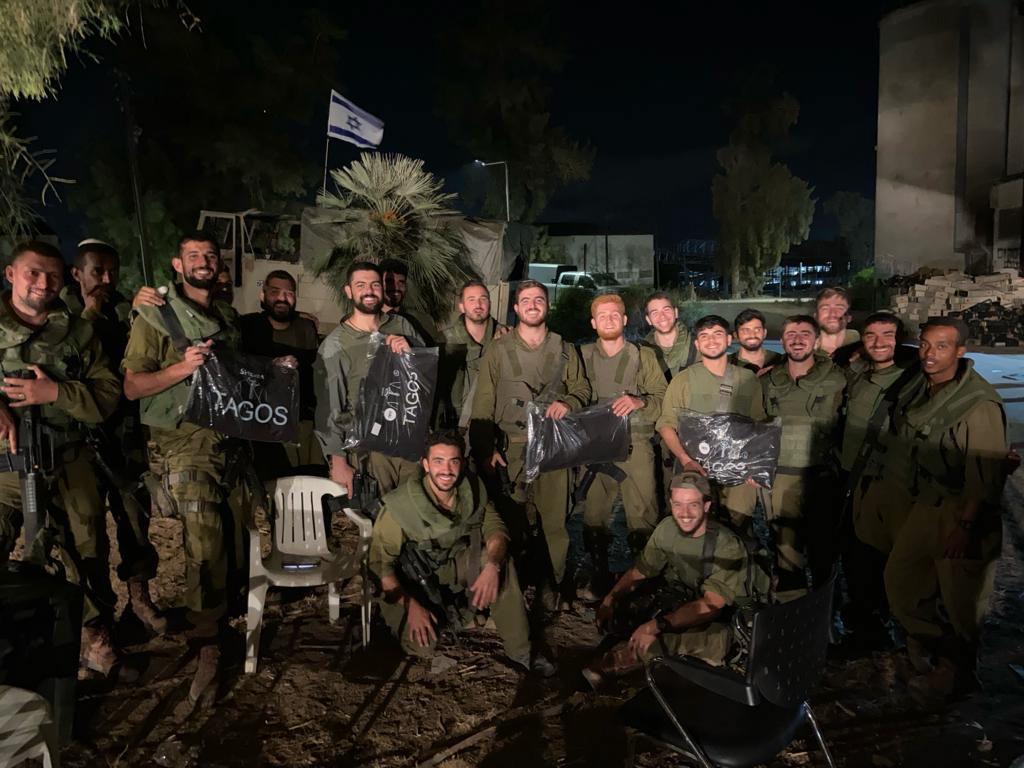 Israeli platoon provided with jackets. Israel has mobilized nearly 10% of its civilian population into war-time readiness. 