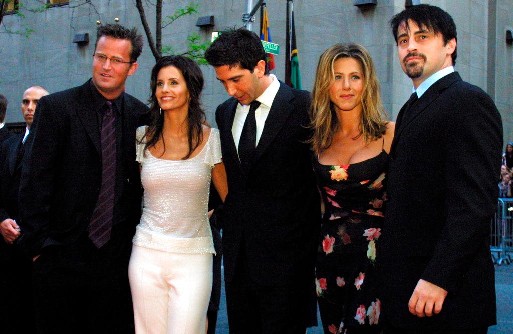 (2002) Friends cast members Matthew Perry, from left, Courteney Cox Arquettte, David Schwimmer, Jennifer Aniston and Matt LeBlanc of the television show "Friends," arrive at New York's Rockefeller Center for NBC's 75th Anniversary event