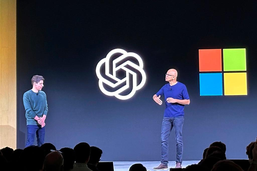 Sam Altman, left, CEO of OpenAI, appears onstage with Microsoft CEO Satya Nadella at OpenAI DevDay, OpenAI's first developer conference, on Monday, Nov. 6, 2023 in San Francisco.