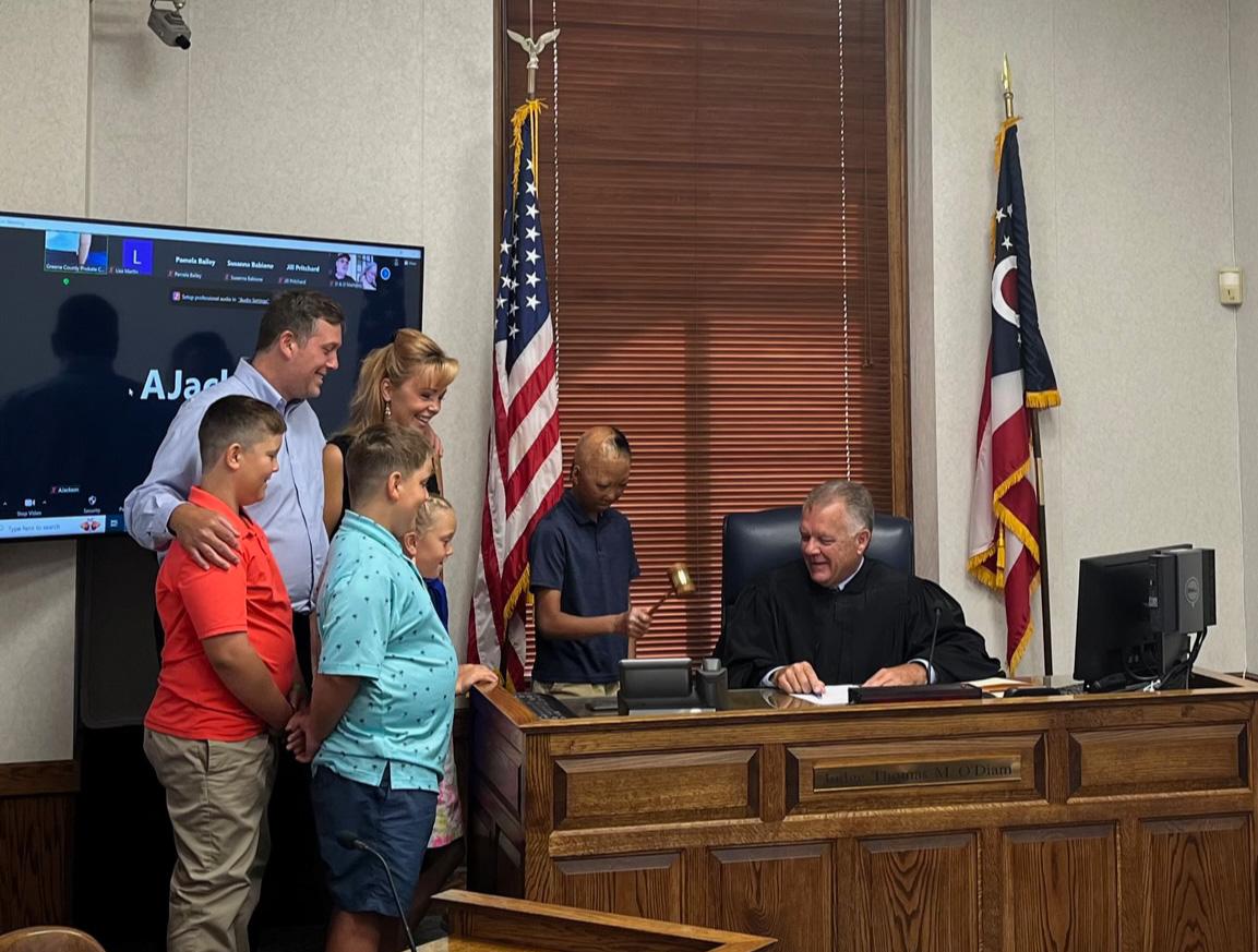 Joey bangs the judge's gavel declaring his official adoption in the Brown family