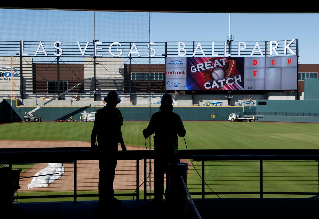 Workers continue construction on a new baseball park in Las Vegas, March 28, 2019.