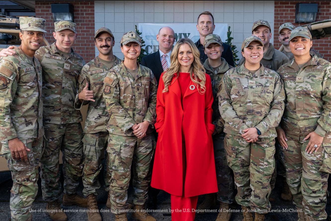 Candace Cameron Bure, Great American Family President Bill Abbott (center left), actor Gabriel Hogan (center right). joined U.S. service men and women and their families at Joint Army and Air Force Base Lewis-McChord (JBLM) in Washington