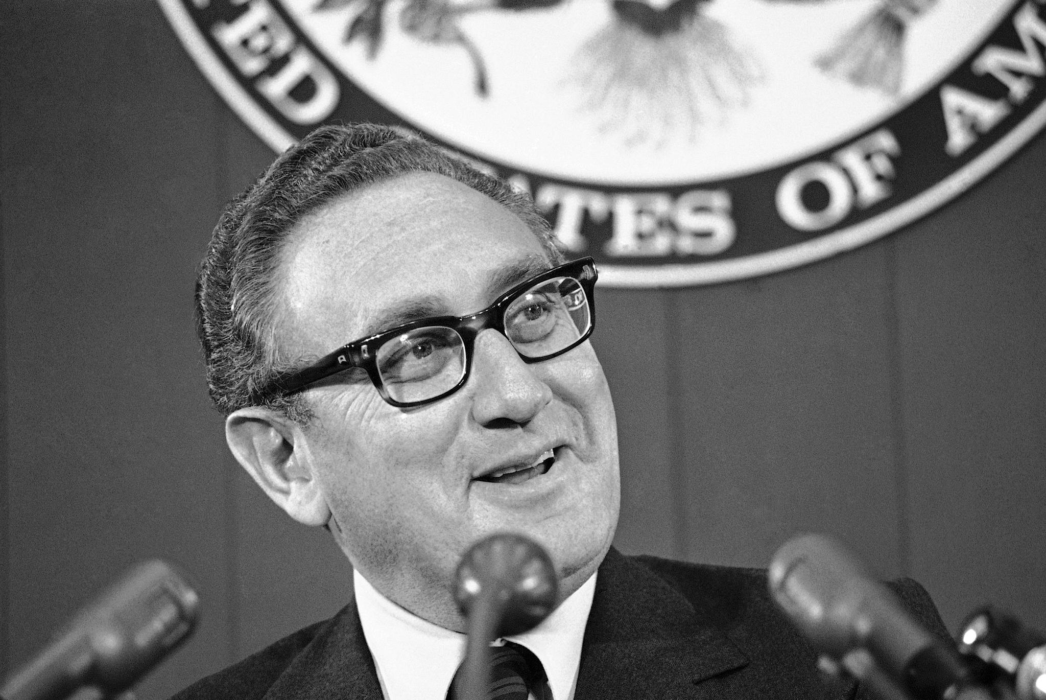 Secretary of State Henry Kissinger briefs reporters, Oct. 12, 1973, at the State Department in Washington.