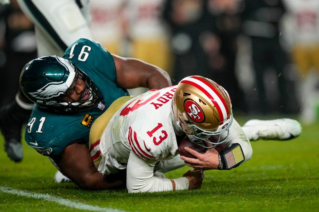 Philadelphia Eagles defensive tackle Fletcher Cox (91) sacks San Francisco 49ers quarterback Brock Purdy (13) 