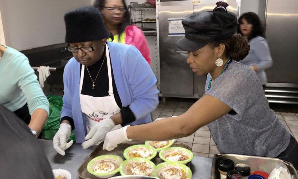 Several women preparing food.