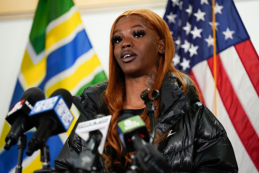 Majiah Washington speaks during a news conference at the Portland Fire & Rescue headquarters 