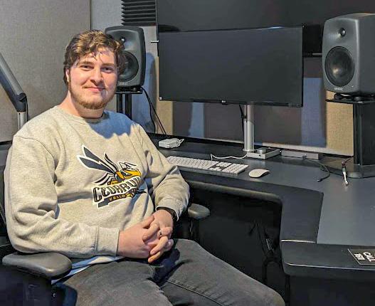 Jair Mobley at K-LOVE, working at a sound studio