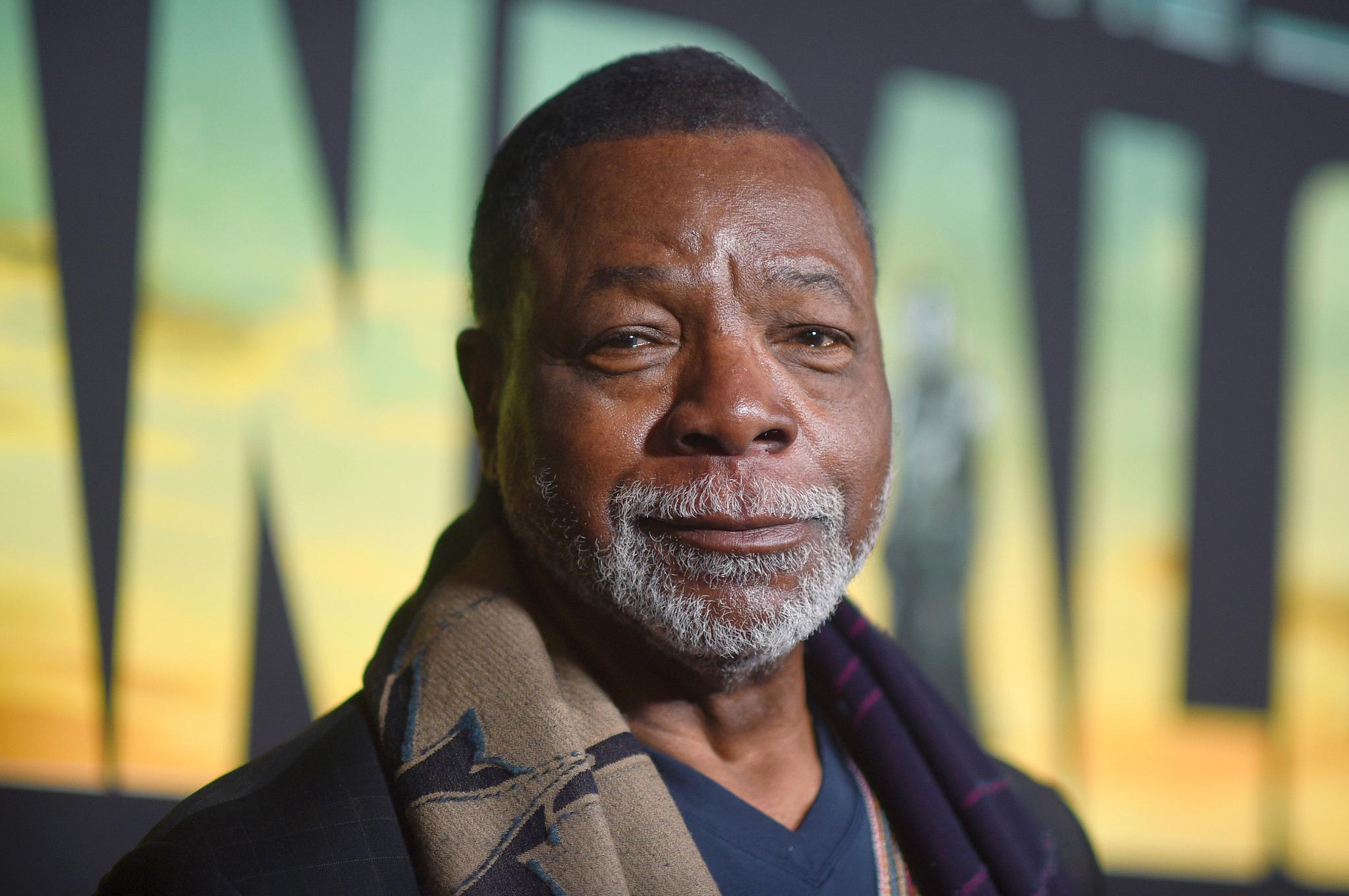 Carl Weathers with grey beard and scarf around his neck