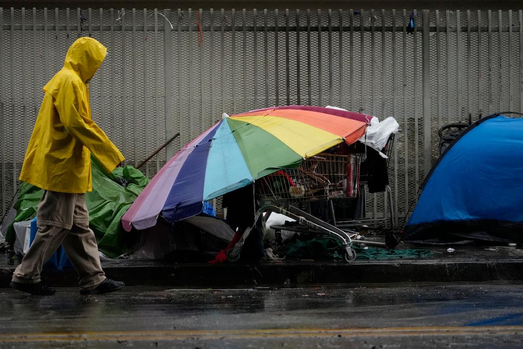 Heavy rain hits temporary tents in Skid Row, one of the largest populations of homeless people in the United States