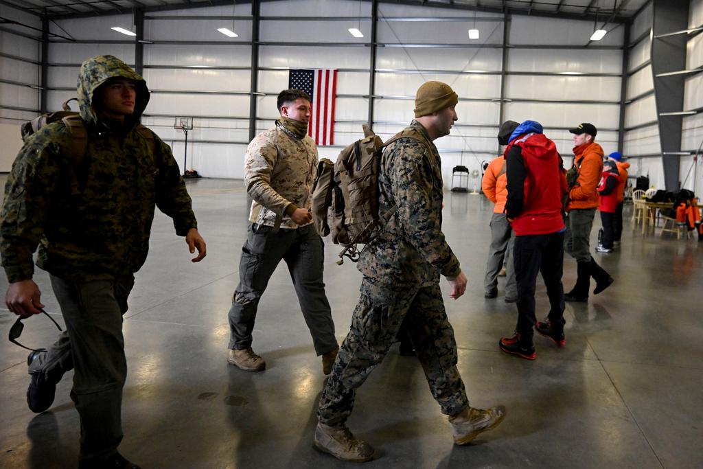 U.S. Marines leave a command center