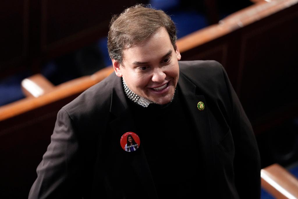Former Rep. George Santos, R-N.Y., wears a Laken Riley button before President Joe Biden delivers the State of the Union address to a joint session of Congress at the U.S. Capitol, Thursday March 7, 2024, in Washington.