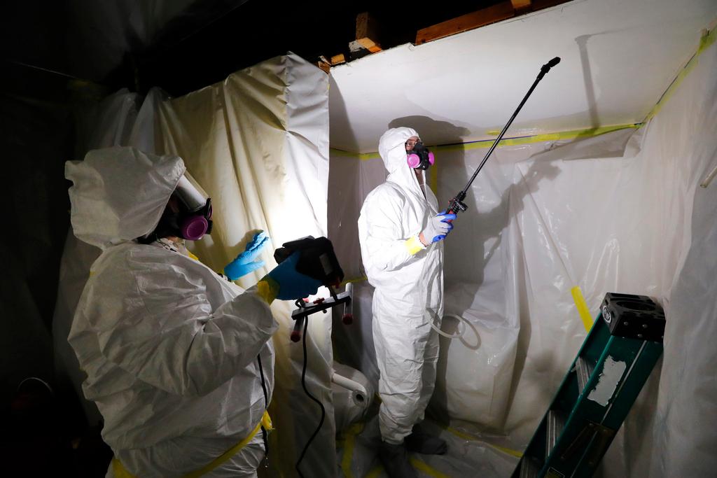 Asbestos removal crew
