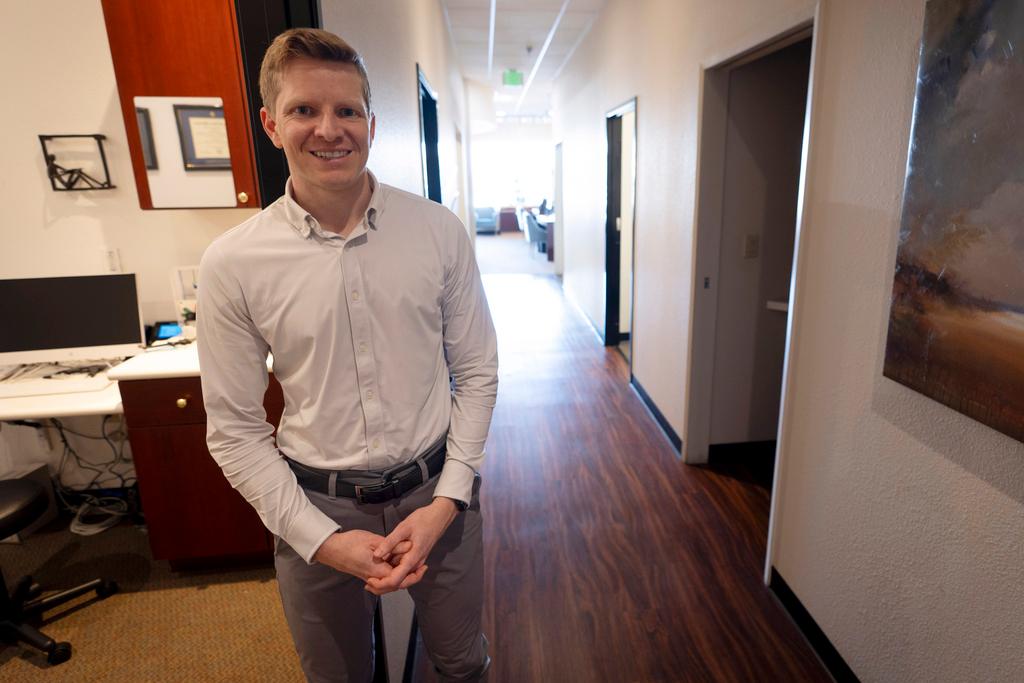 Optometrist Hunter Morgan poses in his offices on Friday, March 1, 2024, in Encinitas, Calif.