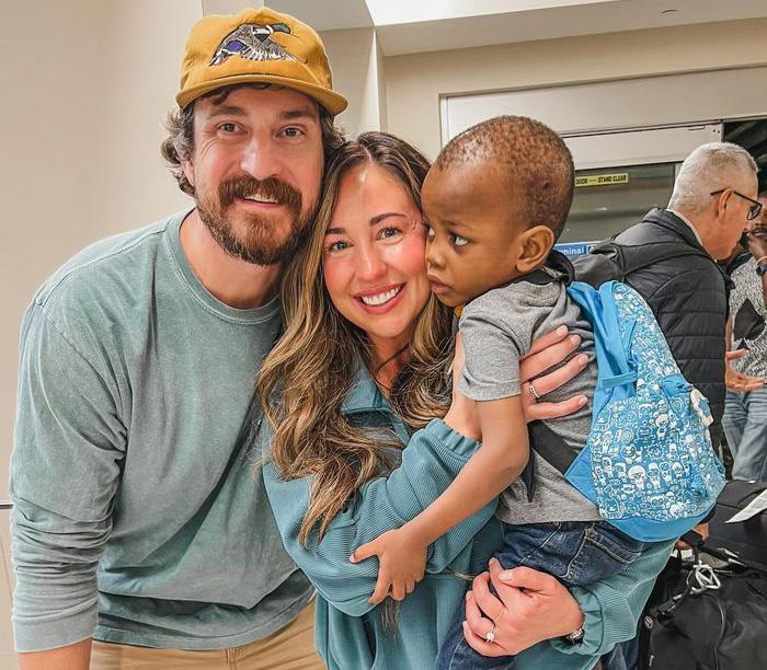 Woman with husband and adopted son