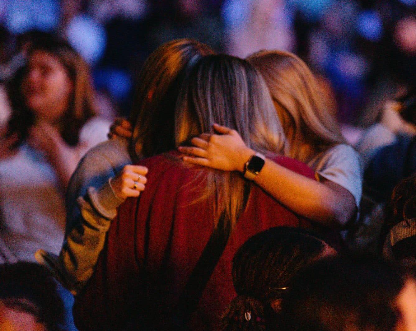 Ladies hugging
