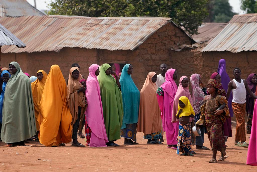 Parents wait for news about the kidnapped LEA Primary and Secondary School Kuriga students in Kuriga, Kaduna, Nigeria