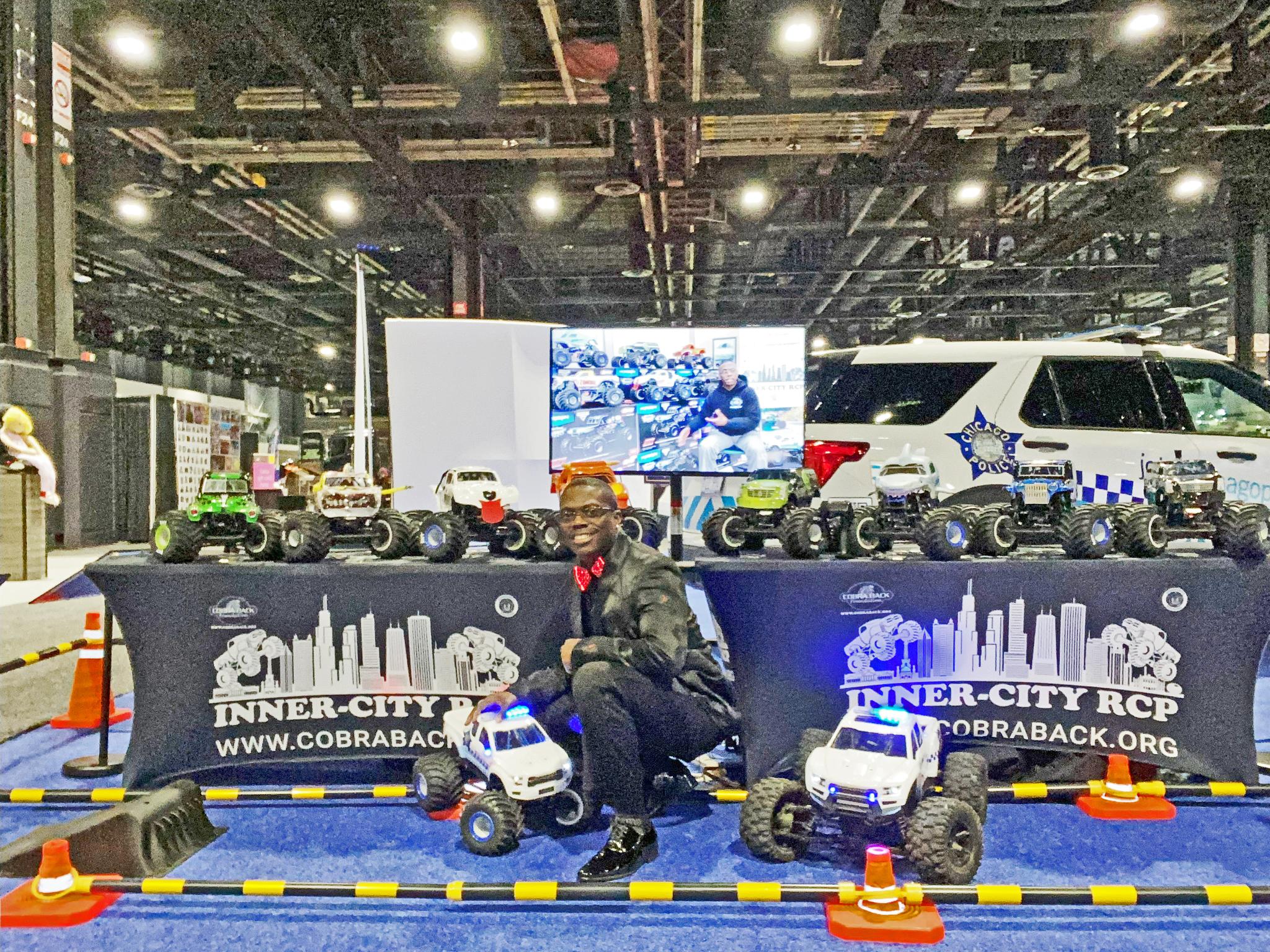 Lt. Dixon with his Monster trucks