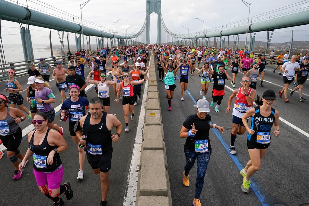 Runners cross the Verrazzano-Narrows Bridge at the start of the New York City Marathon in New York, Sunday, Nov. 6, 2022. 