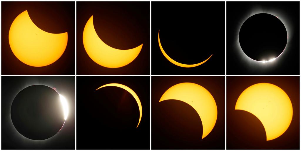 This combination of photos shows the path of the sun during a total eclipse by the moon  Aug. 21, 2017, near Redmond, Ore.