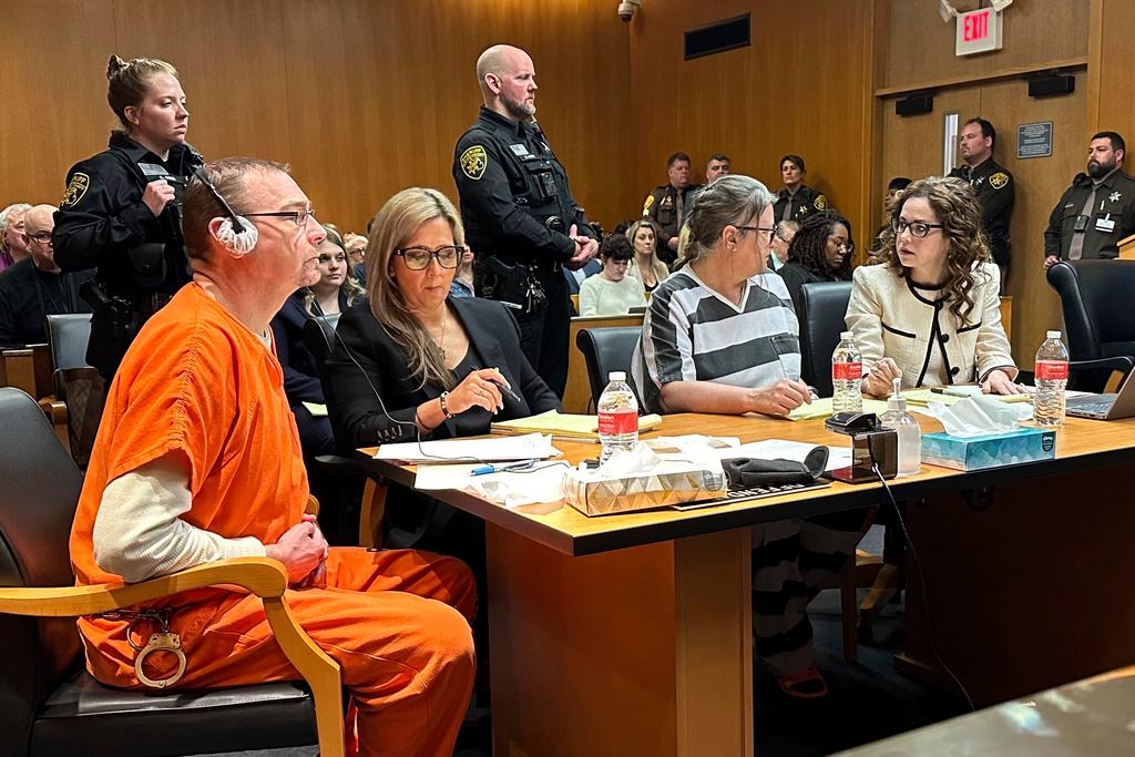 From left, James Crumbley, defense lawyer Mariell Lehman, Jennifer Crumbley, and defense lawyer Shannon Smith