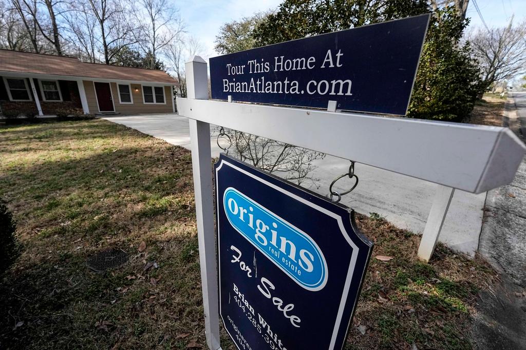 Home For Sale sign outside of a home
