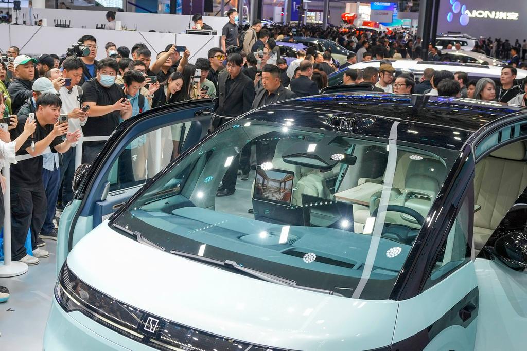 Visitors take photos of a Zeekr car 
