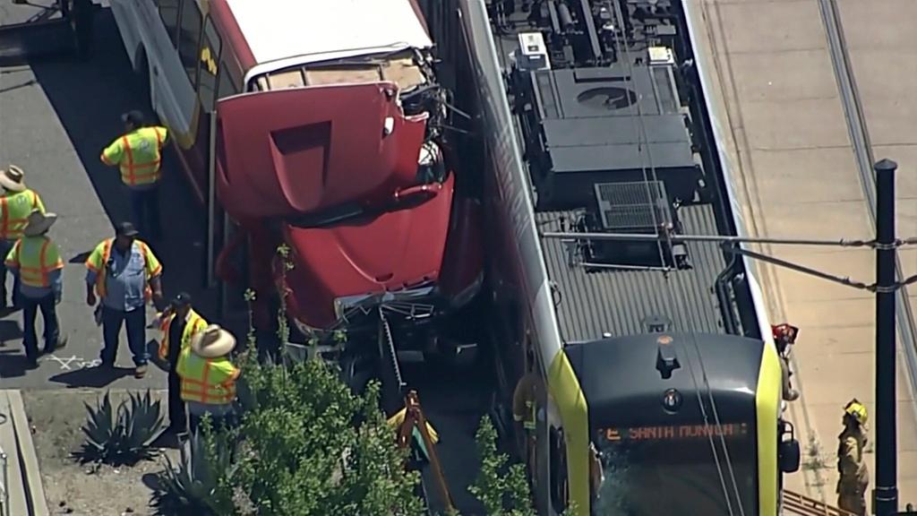 Firefighters respond to bus-train collision 