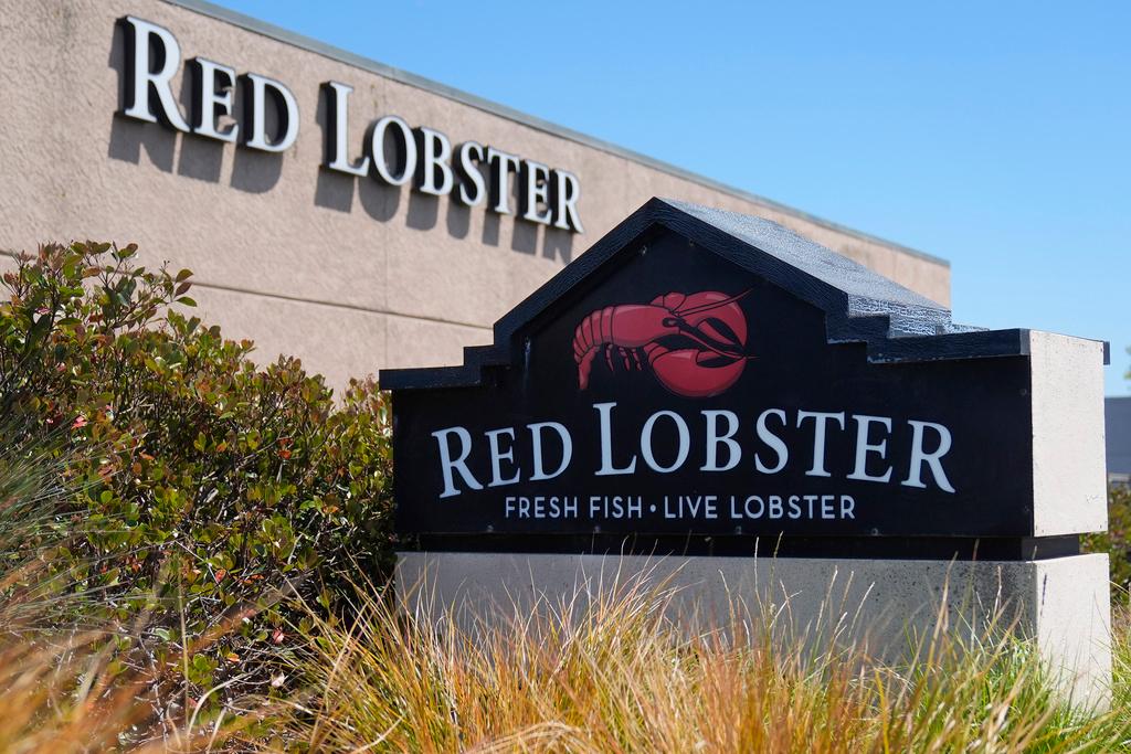 Signs for a Red Lobster restaurant are shown in San Bruno, Calif