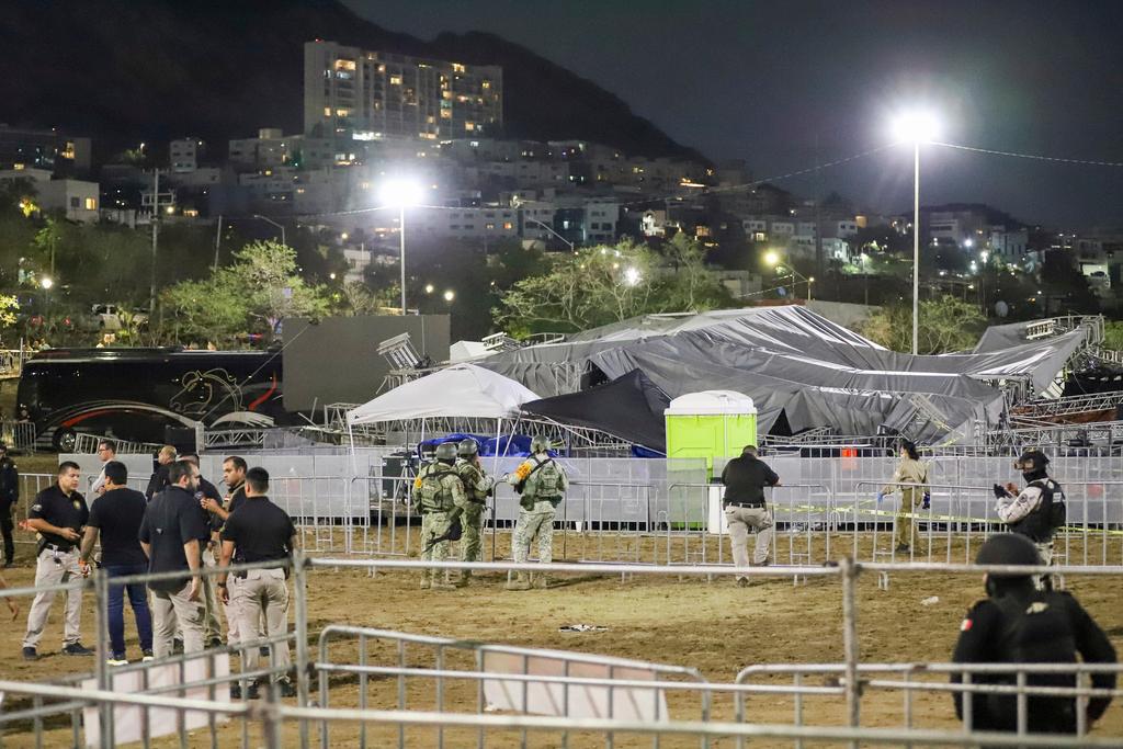 Security forces stand around a stage that collapsed due to a gust of wind during an event attended by presidential candidate Jorge Álvarez Máynez in San Pedro Garza García, on the outskirts of Monterey, Mexico
