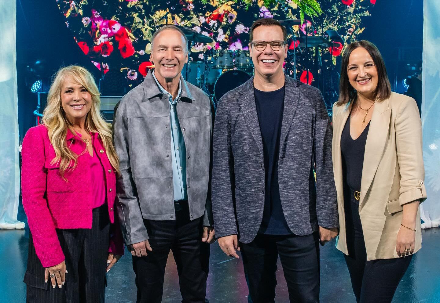 Two smiling couples