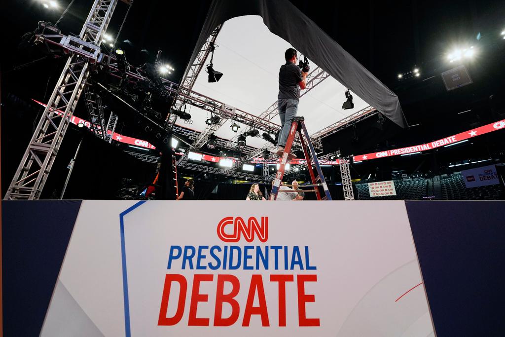  Ben Starett, lighting programmer for CNN, sets up lights in the spin room for the presidential debate between President Joe Biden and Republican presidential candidate former President Donald Trump in Atlanta