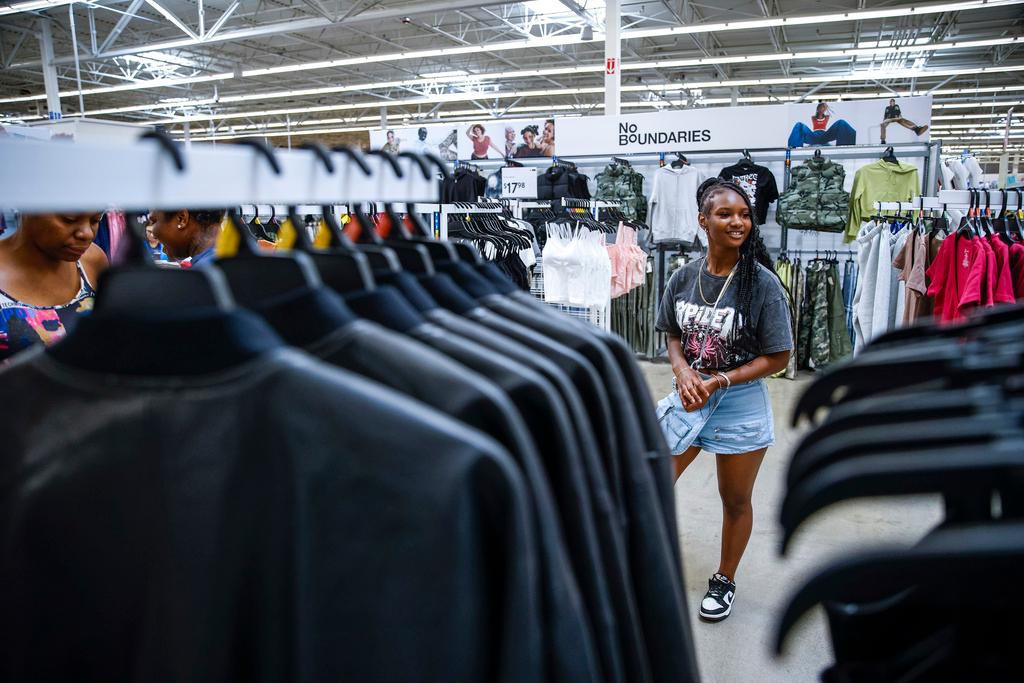 Za'kyra Davis checks out clothes from Walmart's No Boundaries collection at a Walmart Superstore in Secaucus, New Jersey