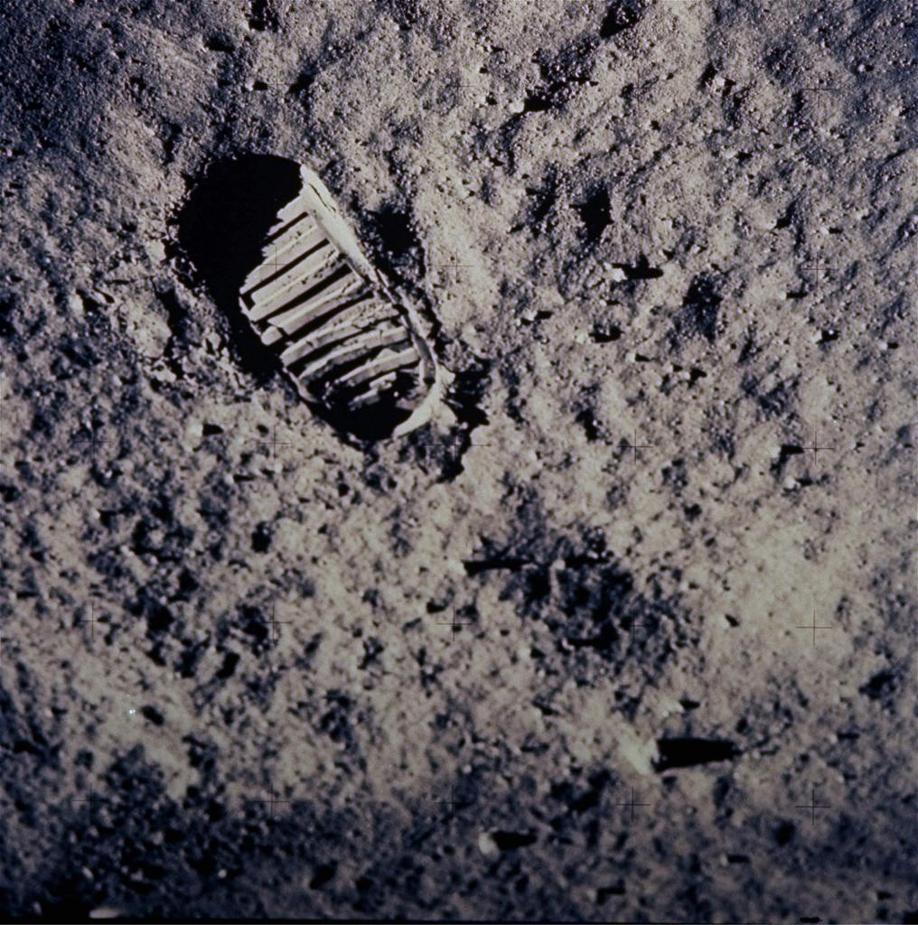 A footprint left by one of the astronauts of the Apollo 11 mission is seen in the soft, powdery surface of the moon 