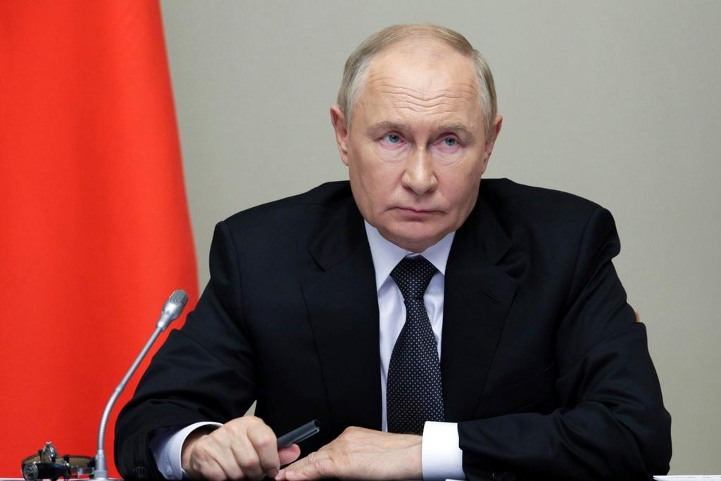 Russian President Vladimir Putin leads the meeting with top security and defence officials dedicated to the situation in Kursk and Belgorod border regions,