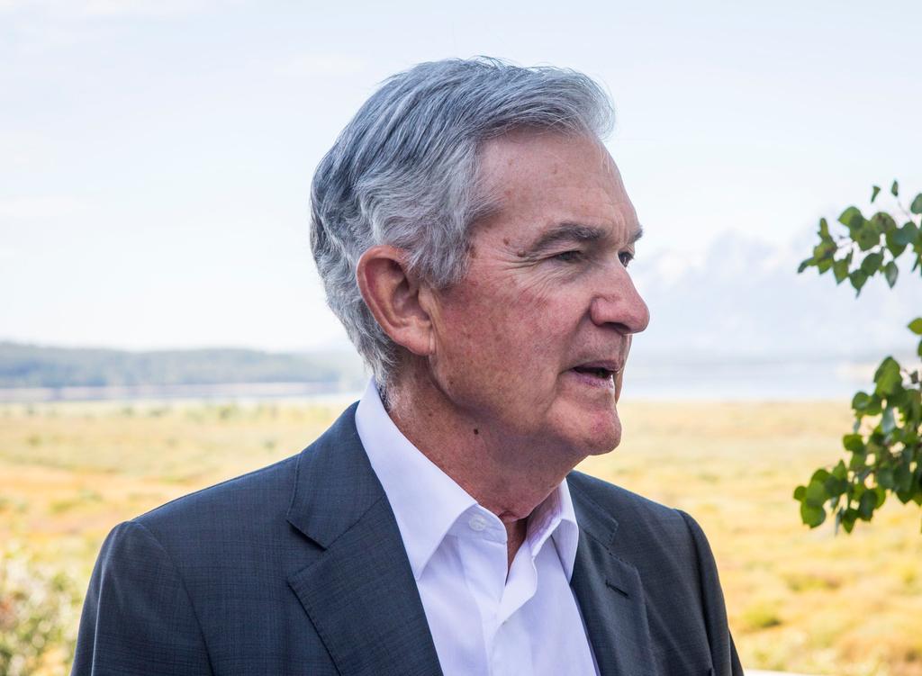 Federal Reserve Chairman Jerome Powell takes a break during the Jackson Hole Economic Symposium