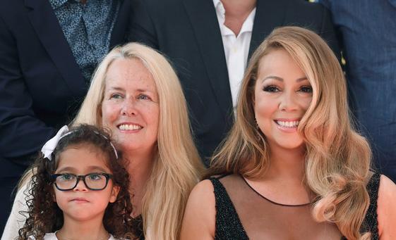 Mariah Carey appears with her mother Patricia and daughter Monroe during a ceremony honoring her with a star on the Hollywood Walk of Fame in Los Angeles on Aug. 5, 2015.