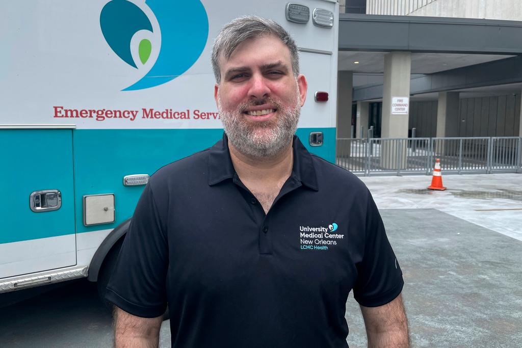 Emergency Room nurse Miles Crawford, who rescued a motorist who had driven into floodwaters as Hurricane Francine moved over the city 