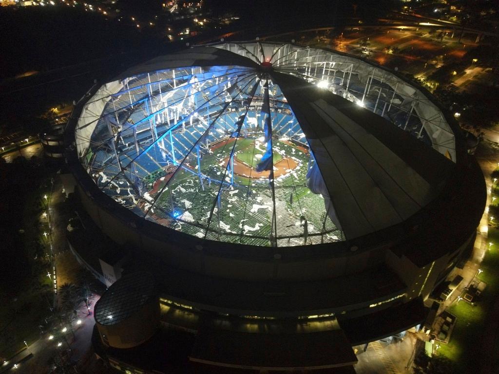 Aerial view of Tropicana Field's shredded roof in downtown St. Petersburg, Fla.,