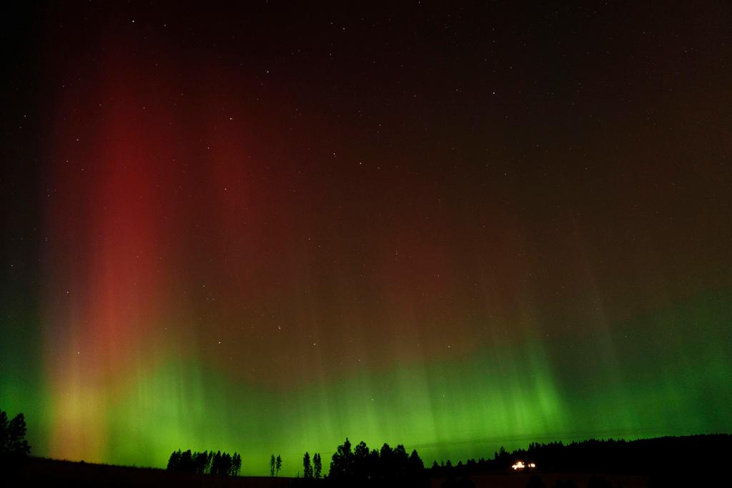 Aurora borealis, also known as the northern lights, is seen in the night sky along with the Big Dipper constellation in Moscow, Idaho