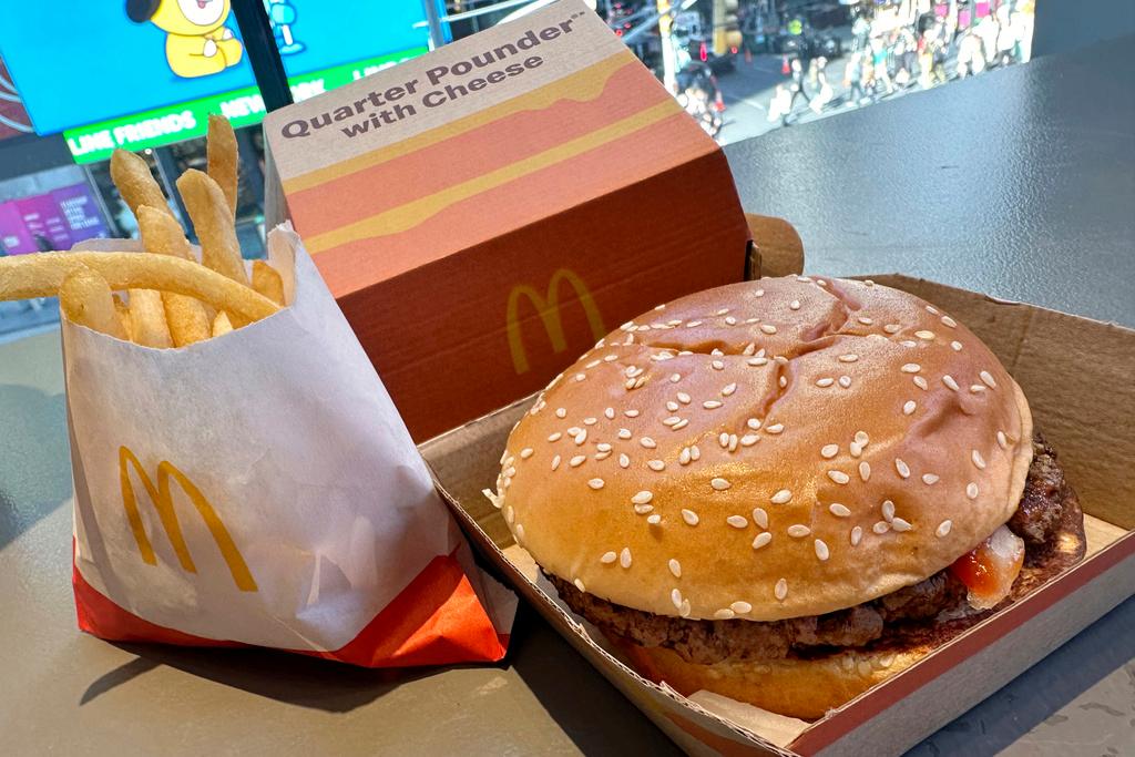 A McDonald's Quarter Pounder hamburger and fries are shown in this photograph, in New York's Times Square, Wednesday, Oct. 23, 2024. 