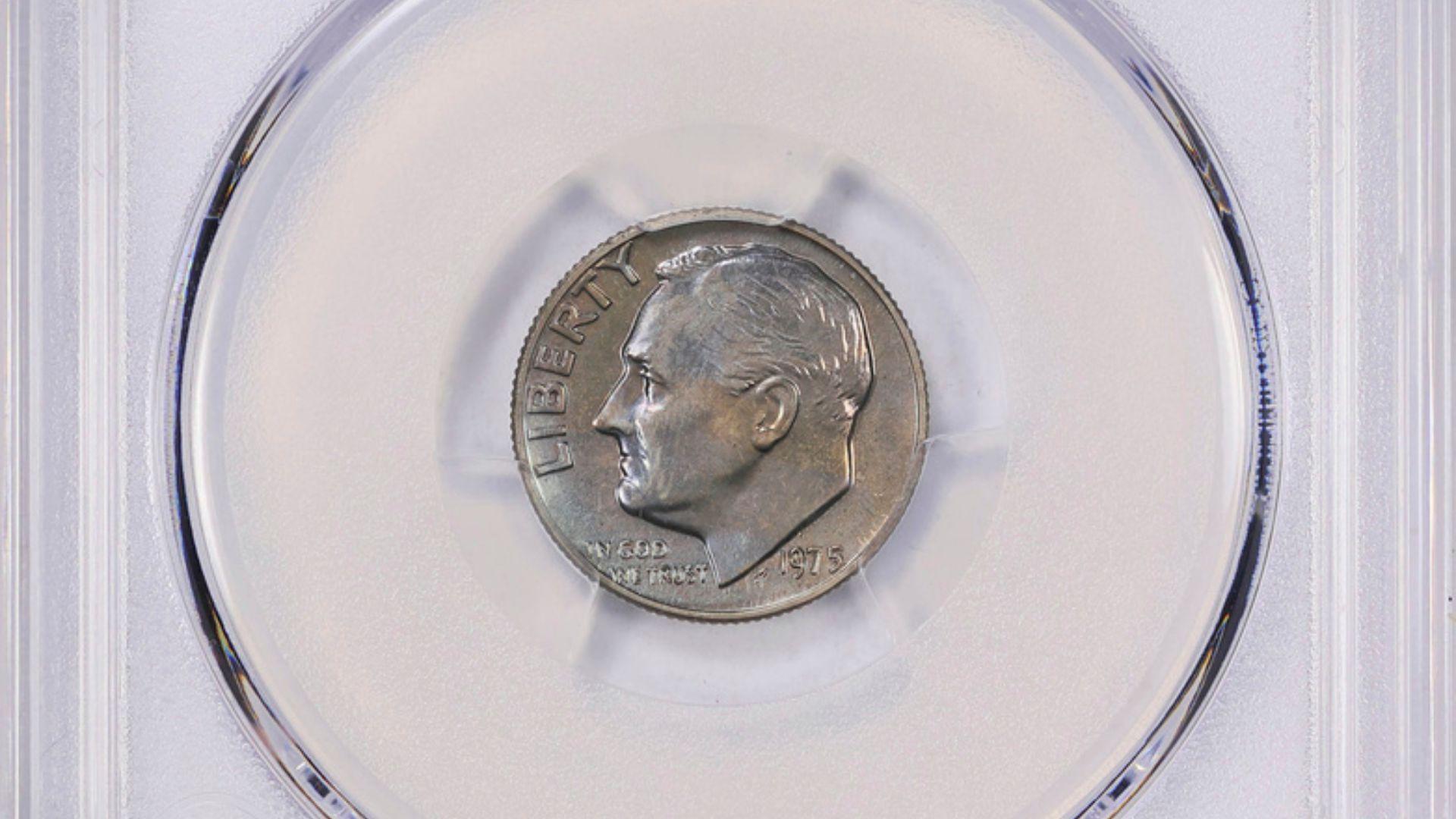 This undated image provided by GreatCollections shows a 1975 proof set dime mistakenly made without the San Francisco Mint's letter S mintmark.