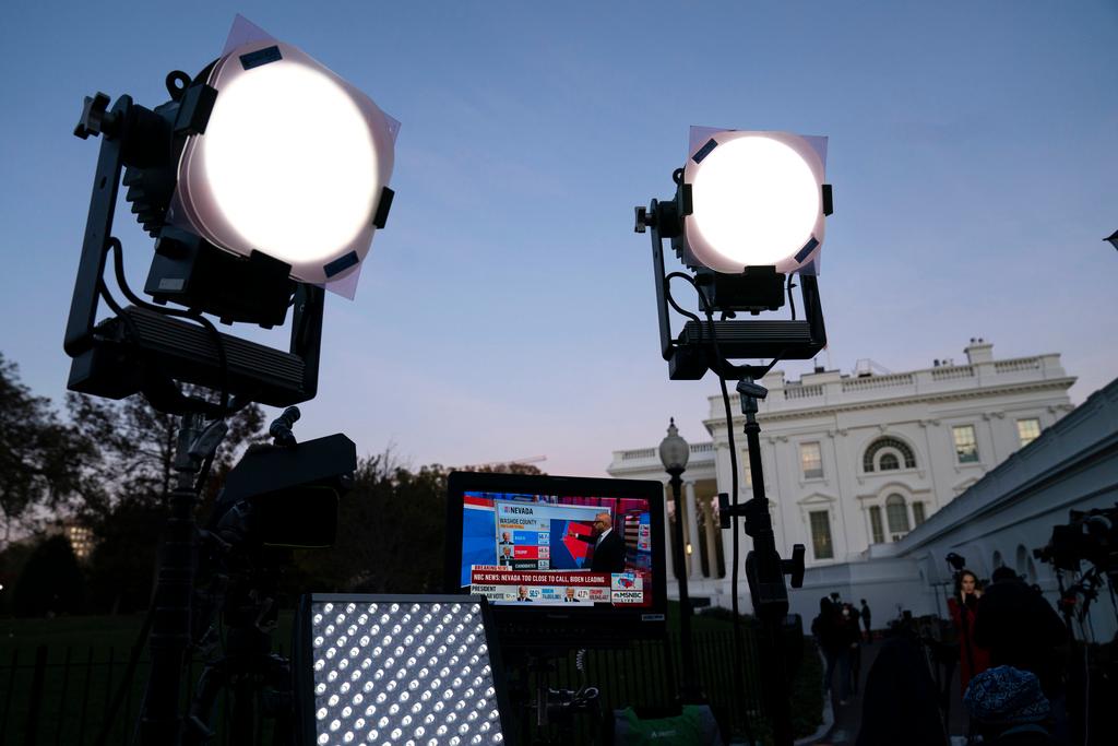 Media organizations set up outside the White House, Friday, Nov. 6, 2020, in Washington.