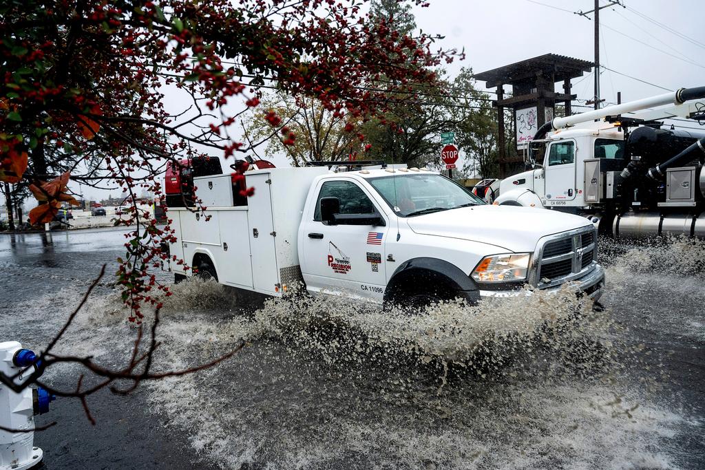 A truck crosses a flooded road Wednesday, Nov. 20, 2024, in Santa Rosa, Calif. 