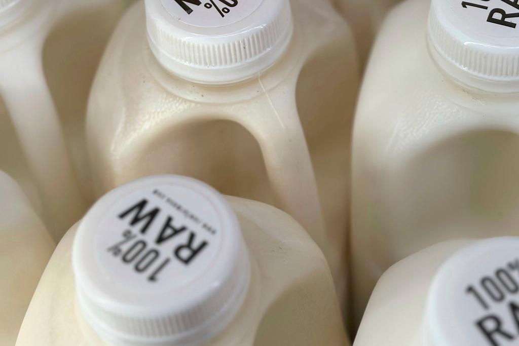 FILE - Bottles of raw milk are displayed for sale at a store in Temecula, Calif., on Wednesday, May 8, 2024.