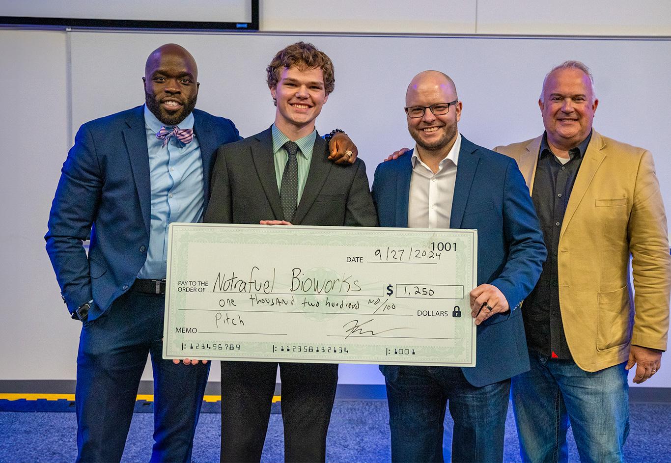 The Pitch Winner with the judges - (left to right) Tunji Adebayo, Daniel Ormsbee, Scott Moffat and Jim Stevenson