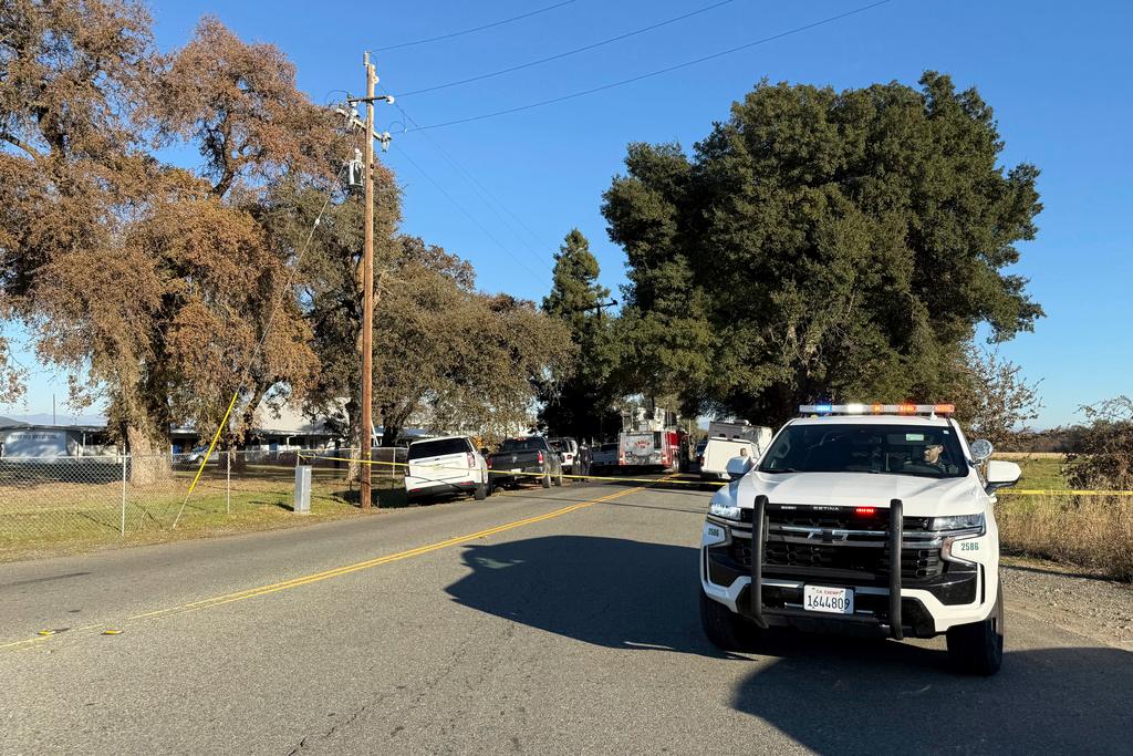 Police tape blocks a road outside the Feather River Adventist School 